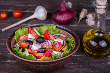 Fresh vegetable greek salad on the table