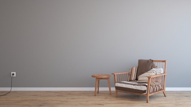 Minimal empty and clean grey wall with wooden floor, armchair and table