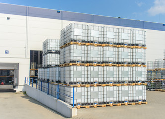 Packed pallets standing outdoors at a warehouse