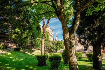 Park near the amphitheatre with view on Curch of St. Anthony in Pula, Croatia