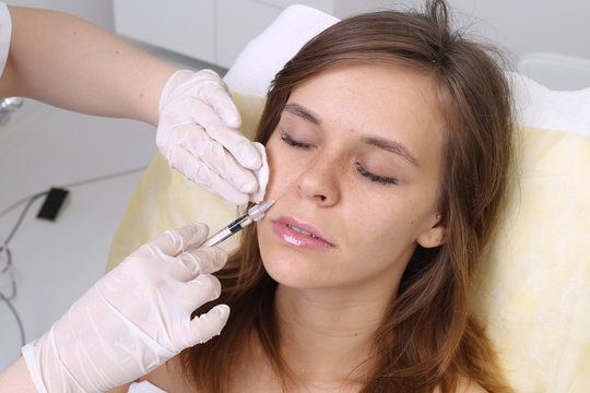 Rejuvenation procedure in beauty clinic, filler injection.