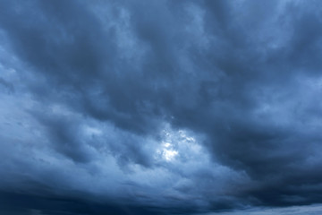 Naklejka na ściany i meble Dramatic black clouds, Dark sky befor rainy