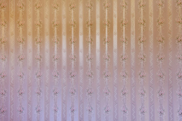 Vintage beige wallpaper with floral pattern.