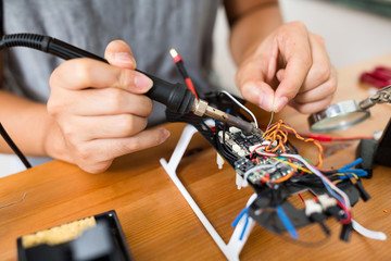 Welding wires on flying drone board