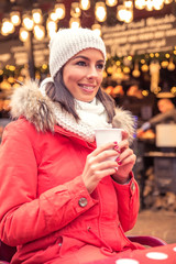 Young woman on the christmas market