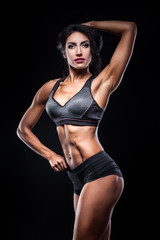 Fototapeta na wymiar studio shot of perfect body of bodybuilder female;