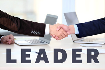 Obraz premium Business training concept. Two businessmen shaking hands in the office