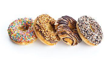 various donuts on white background