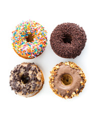 various donuts on white background