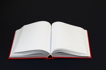 Open book, stack of hardback book on table. Back to school. Copy space. Top view