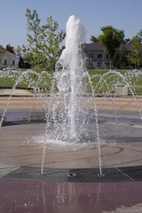 Splashes of a fountain in the park