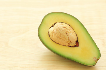 Fresh of half avocado on wood