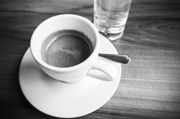 Cup of espresso coffee, black and white
