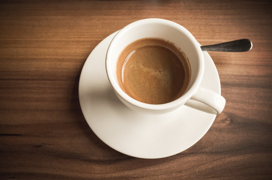 Freshly brewed espresso coffee in cup
