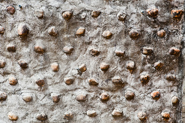 stone in cement wall for background and texture