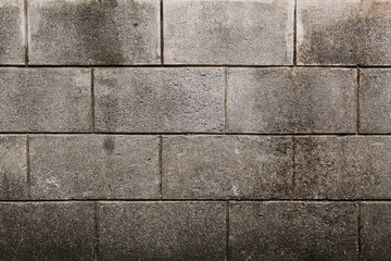 Naklejka premium Concrete block wall seamless background and texture