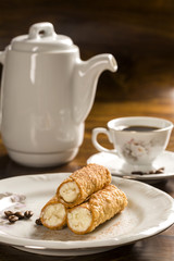 typical Sicilian pastries called CANNOLI with amarena listed in