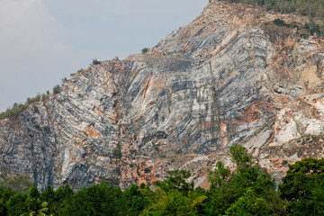 Fototapeta premium Summer landscape with rock in the valley of the sun in the morning
