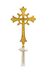 Antique gold cross on white background
