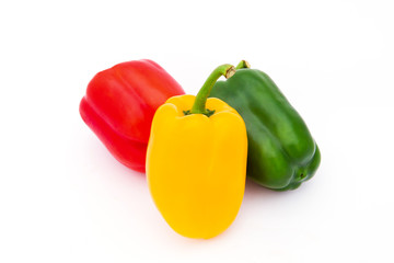 Fresh vegetables Three sweet Red, Yellow, Green Peppers isolated