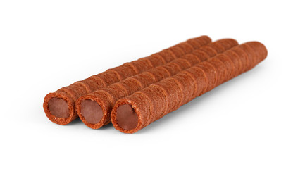 Chocolate sticks on white background