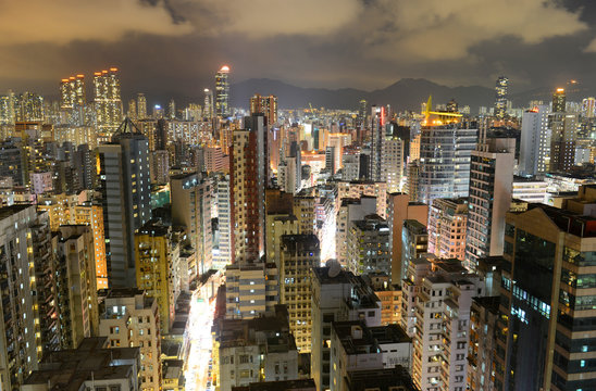 Hong Kong Kowloon Skyline at night from Tsim Sha Tsui on Kowloon.