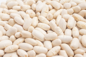 Close-up on a White beans frame in white background. Phaseolus v