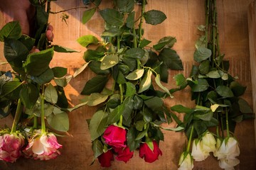 Flowers on the wooden worktop at flower shop