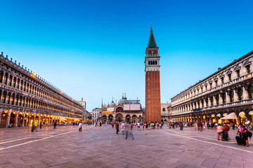 Fototapeta na wymiar San Marco square with Campanile and Saint Mark's Basilica at dusk. The main square of the old town. Venice, Italy.