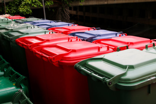 Green,Blue , red bins , recycling bins , trash cans and public hospitals .