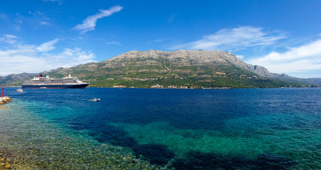 Big cruiser anchored in bay next to Korcula island, Croatia.