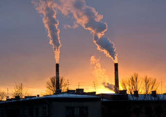 Power plant with smoke and dirty orange air Saint-Petersburg