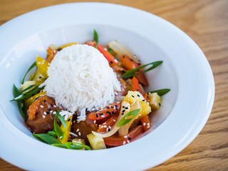 chicken in teriyaki sauce with rice and vegetables