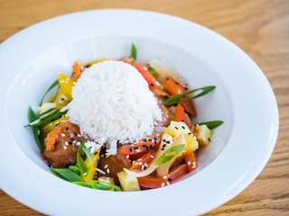 chicken in teriyaki sauce with rice and vegetables