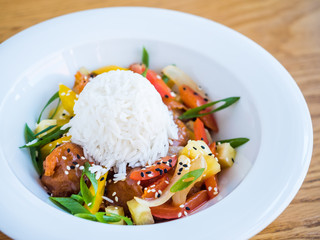 chicken in teriyaki sauce with rice and vegetables