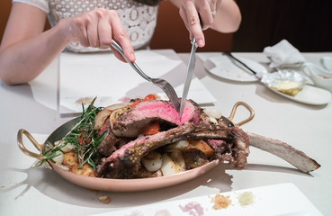Juicy steak with fork and knife
