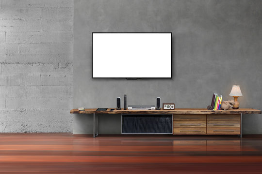Living room led blank screen tv on concrete wall with wooden tab