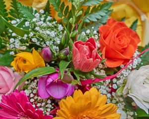 various colorful flowers bouquet closeup, natural background