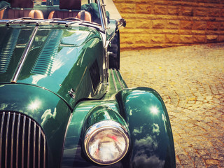Vintage green retro automobile - 117467145