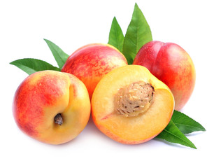 Ripe nectarine with leaves