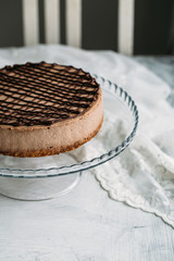 Chocolate cheesecake on a white background