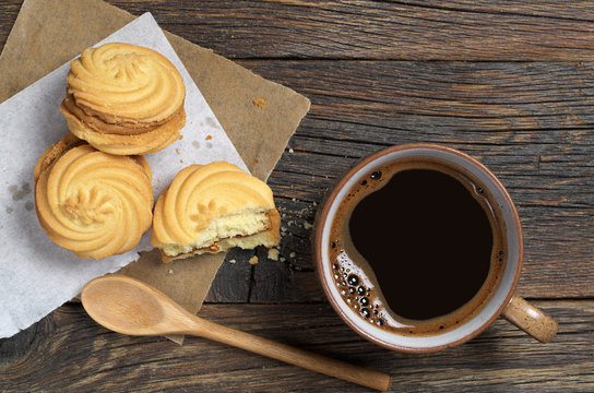 Coffee cup with cookies