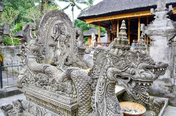 Stone-Carved Guardian Sculptures at Tirta Empul Temple in Bali