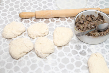 cooking cakes of the dough in the kitchen