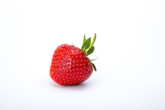  strawberries close up on white background