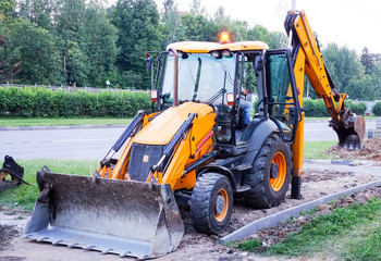 Tractor digging the ground