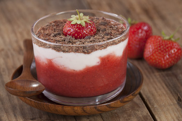 Strawberry smoothie with yogurt and grated chocolate.