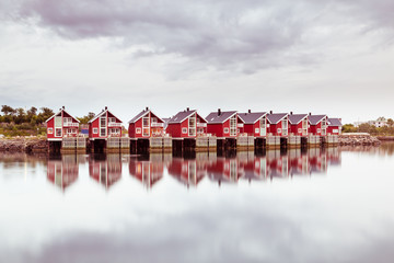 Beautiful rorbu or fisherman's houses in Svolvaer Lofoten Islands in Norway - obrazy, fototapety, plakaty