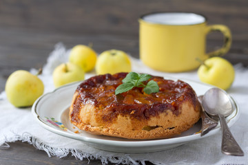Homemade apple pie with caramel and fresh apples, rustic style, selective focus