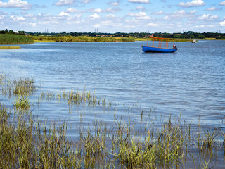 Blue Boat on the River Alde in Suffolk
